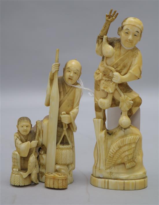 Two Japanese walrus ivory groups, early 20th century, tallest 14.5cm